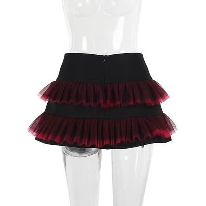 Mesh garter belt ruffle zip-up mini skirt