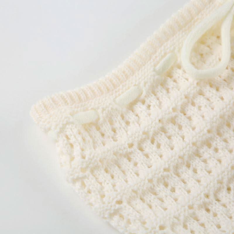 Hollow out drawstring fluffy self tie solid cut out mini skirt