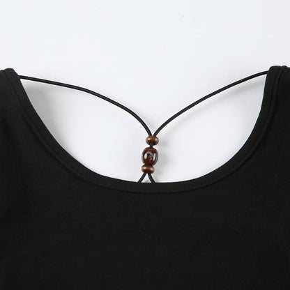 Long sleeve cross back beaded bodysuit