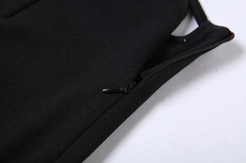 Hollow out metal chain self tie zip-up cut out mini skirt