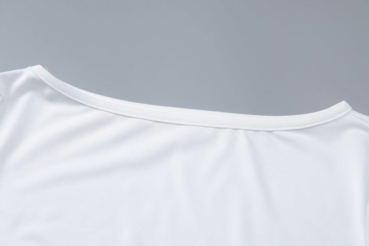 Long flared sleeve crewneck irregular solid top