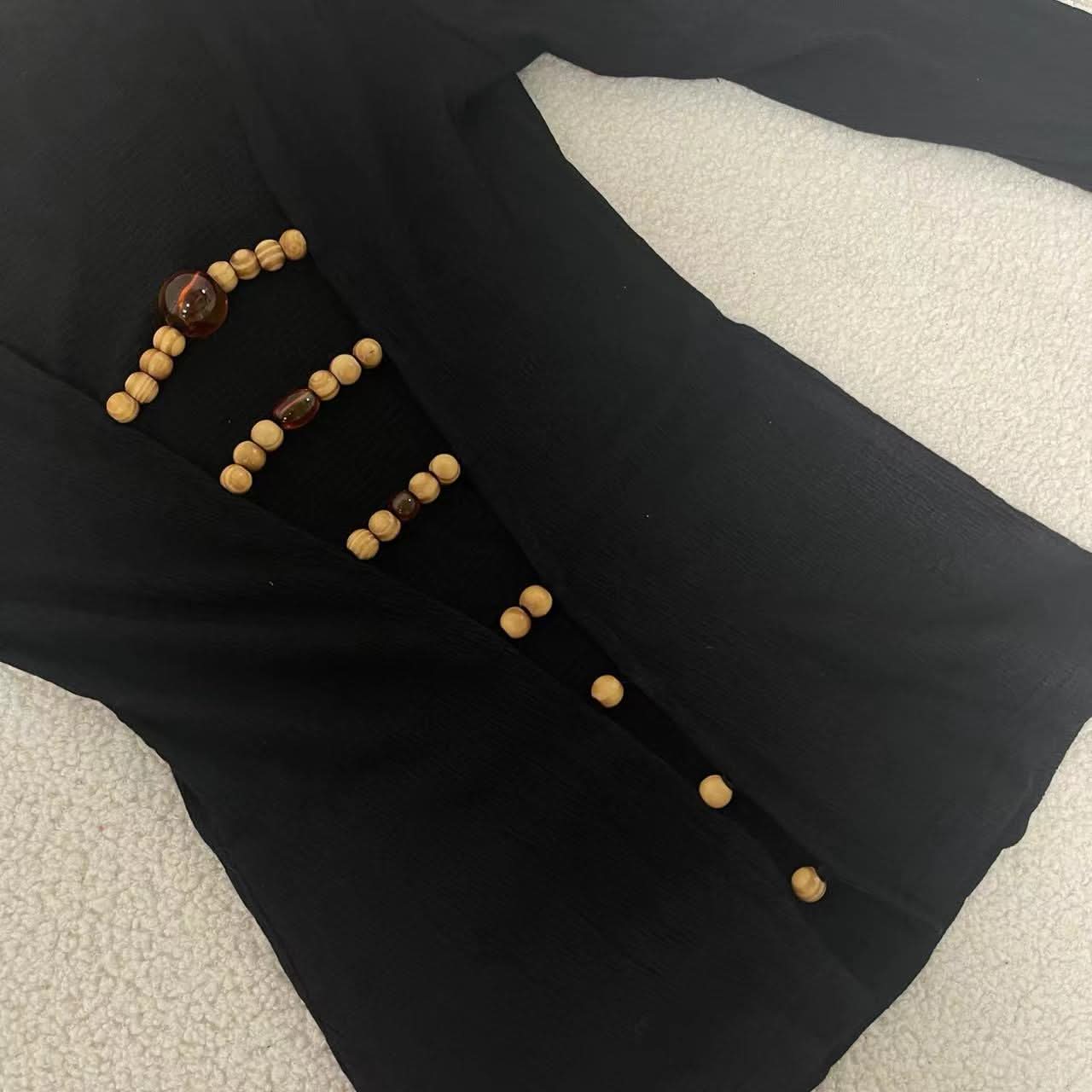 Long sleeve hollow out beaded v neck cut out top