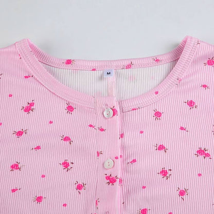 Long sleeve crewneck button flower print romper