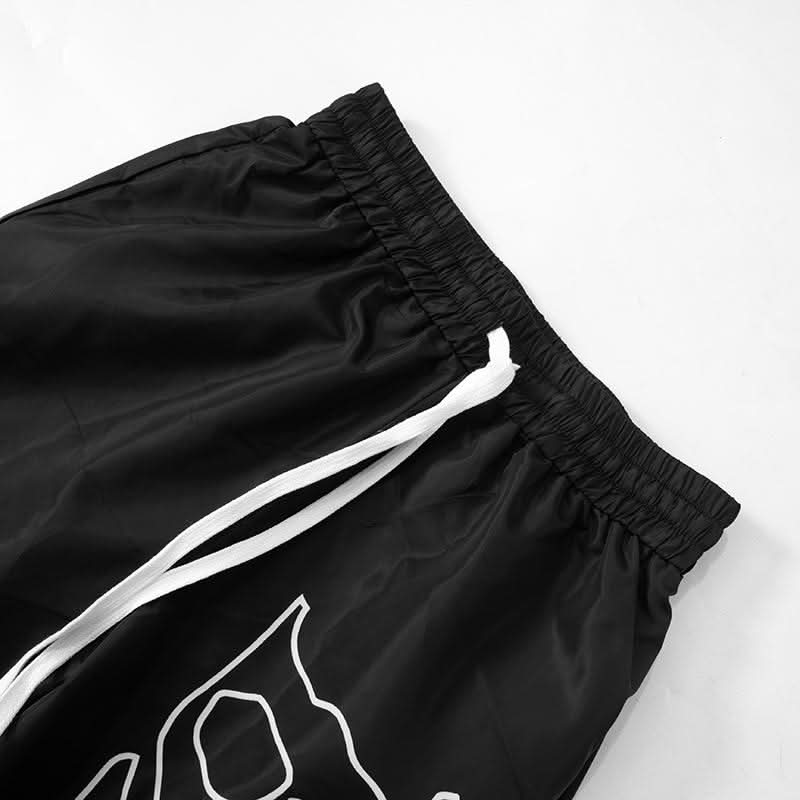 Drawstring self tie letter print medium rise pocket pant