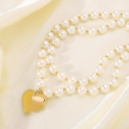 Heart pendant layered faux pearl necklace