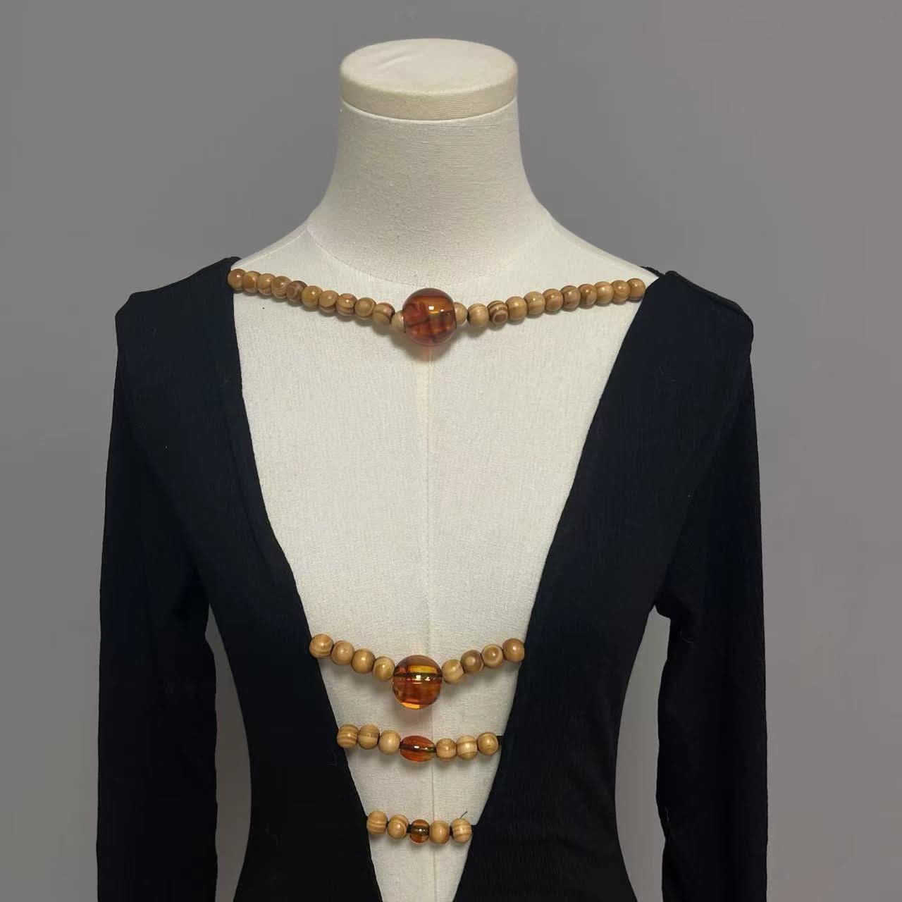 Long sleeve hollow out beaded v neck cut out top