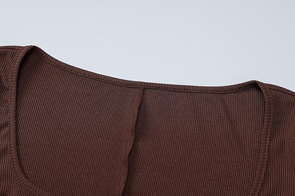 Ribbed notch neck long sleeve solid romper