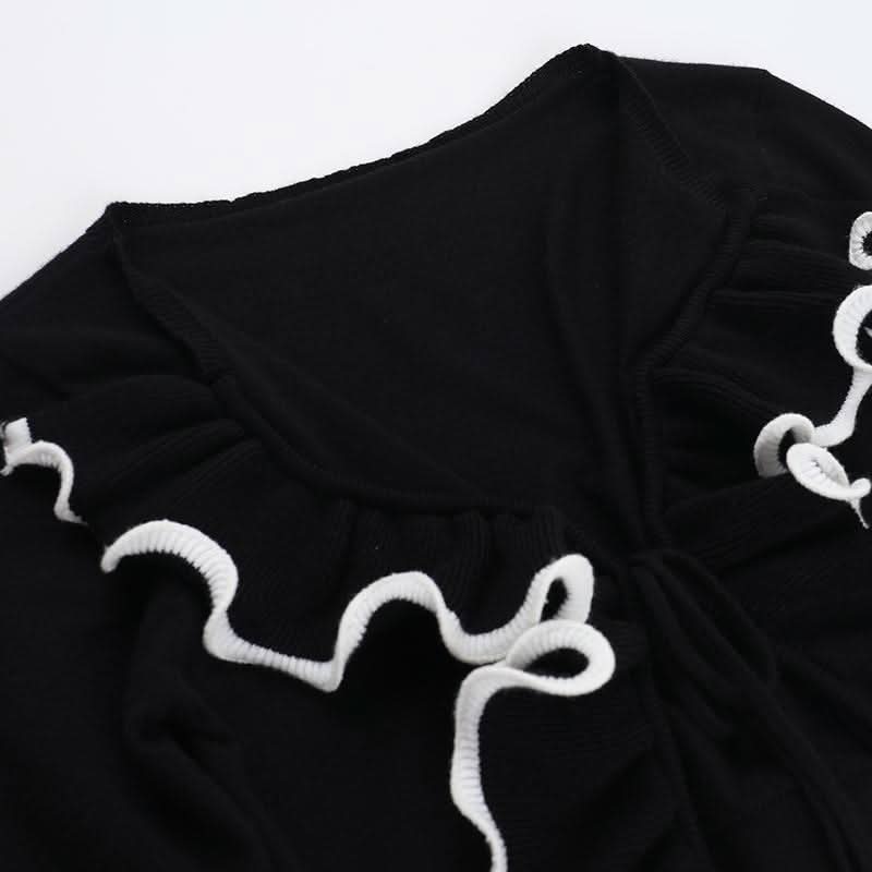 Long flared sleeve ruffle v neck self tie ruched top