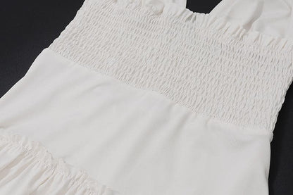 Halter smocked knotted ruched ruffle mini dress
