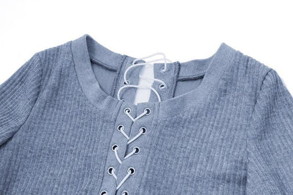 Long sleeve hollow out lace up textured round neck cut out top