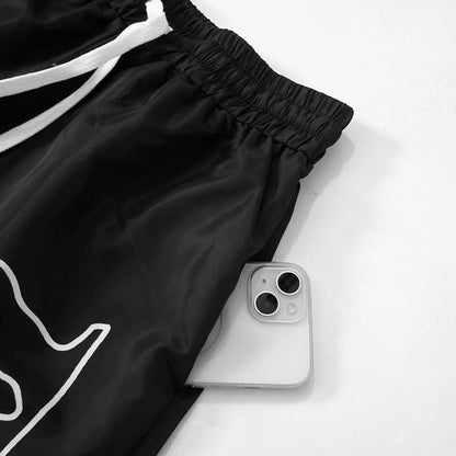 Drawstring self tie letter print medium rise pocket pant