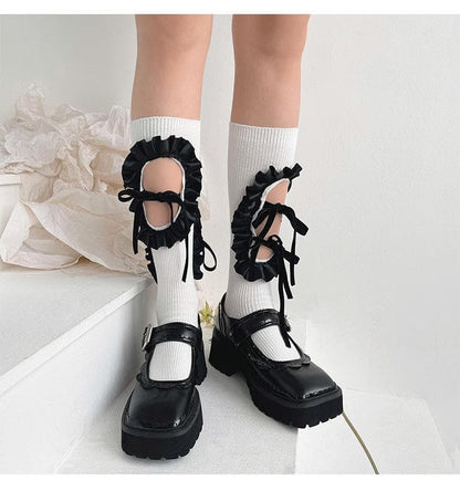 Hollow out bowknot ruffle irregular knee high socks