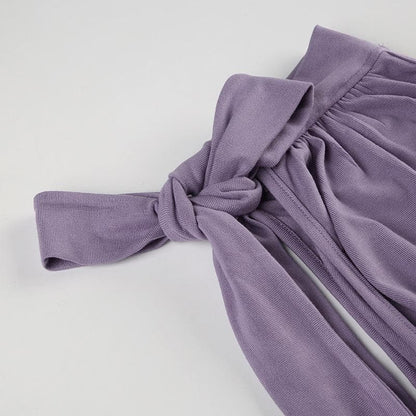 Sleeveless high neck knotted ruched top