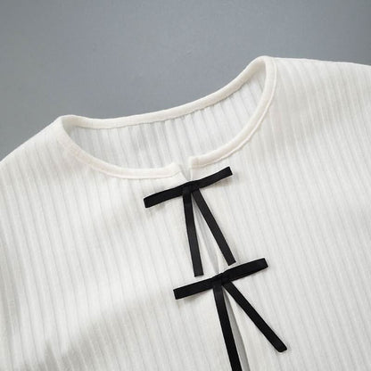 Long sleeve slit hollow out bowknot textured cut out top