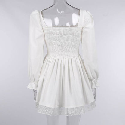Long sleeve smocked lace up lace hem mini dress