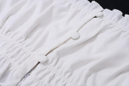 Smocked solid cap sleeve ruffle button mini skirt set