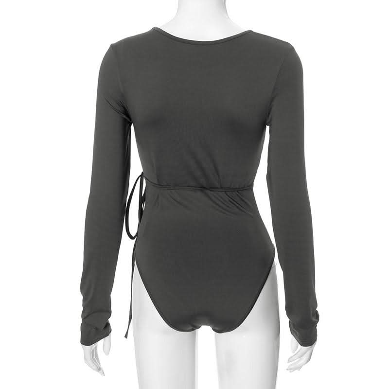 Hollow out long sleeve irregular self tie button bodysuit