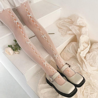 Fishnet hollow out faux pearl bowknot tights