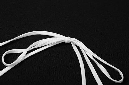 Backless self tie textured halter sleeveless ruffle crop top