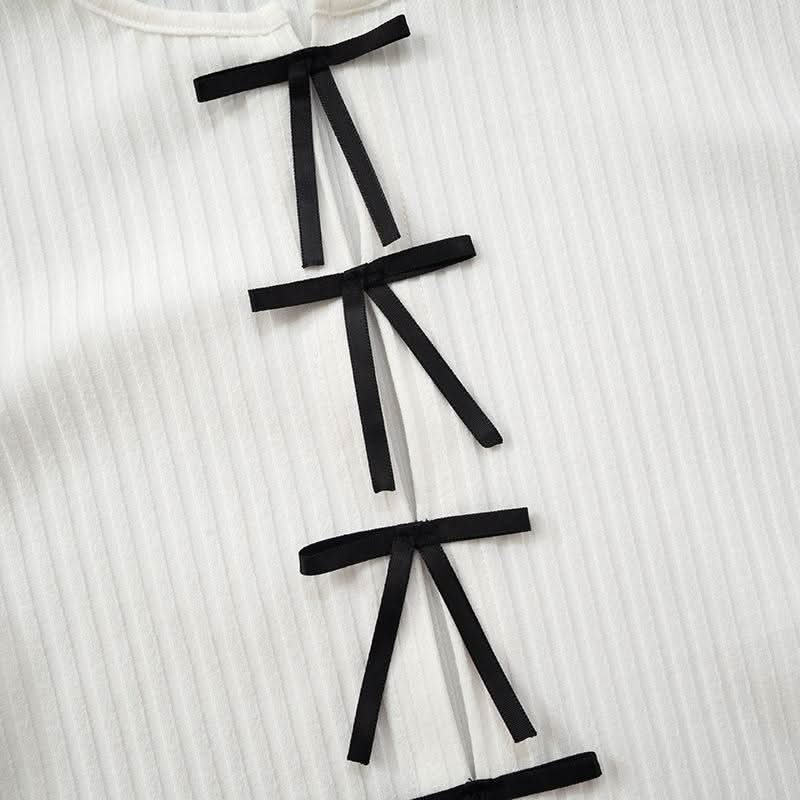 Long sleeve slit hollow out bowknot textured cut out top