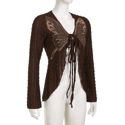 Textured butterfly pattern self tie long sleeve v neck crop top