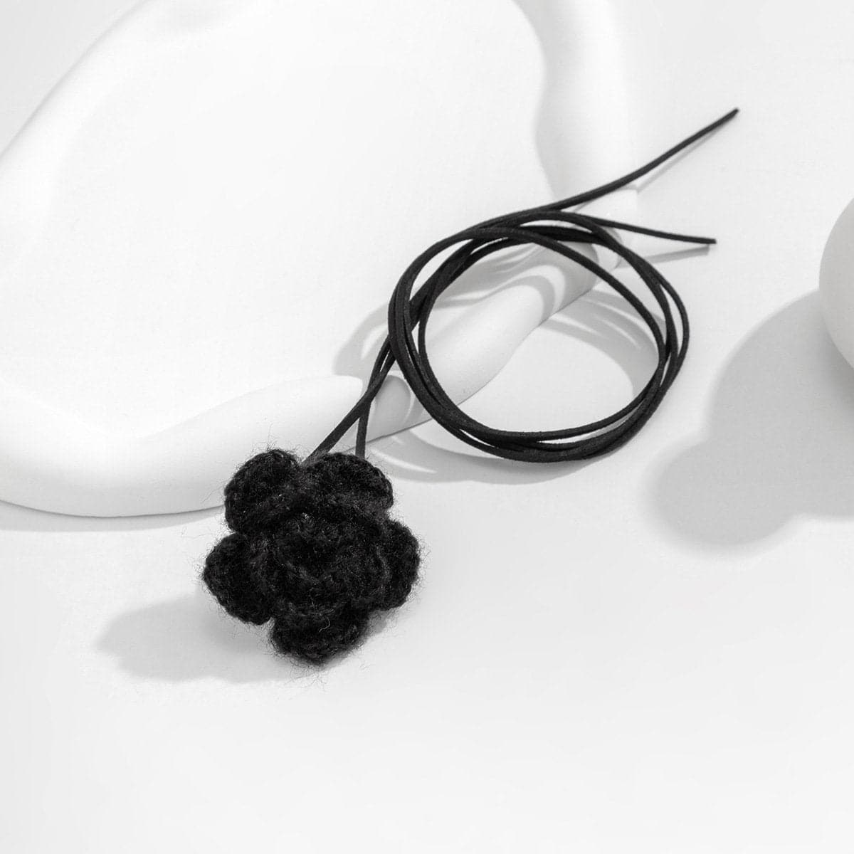 Knitted self tie flower applique waist chain