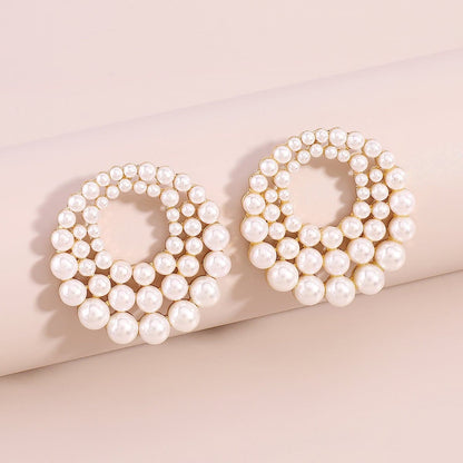 Faux pearl layered stud earrings
