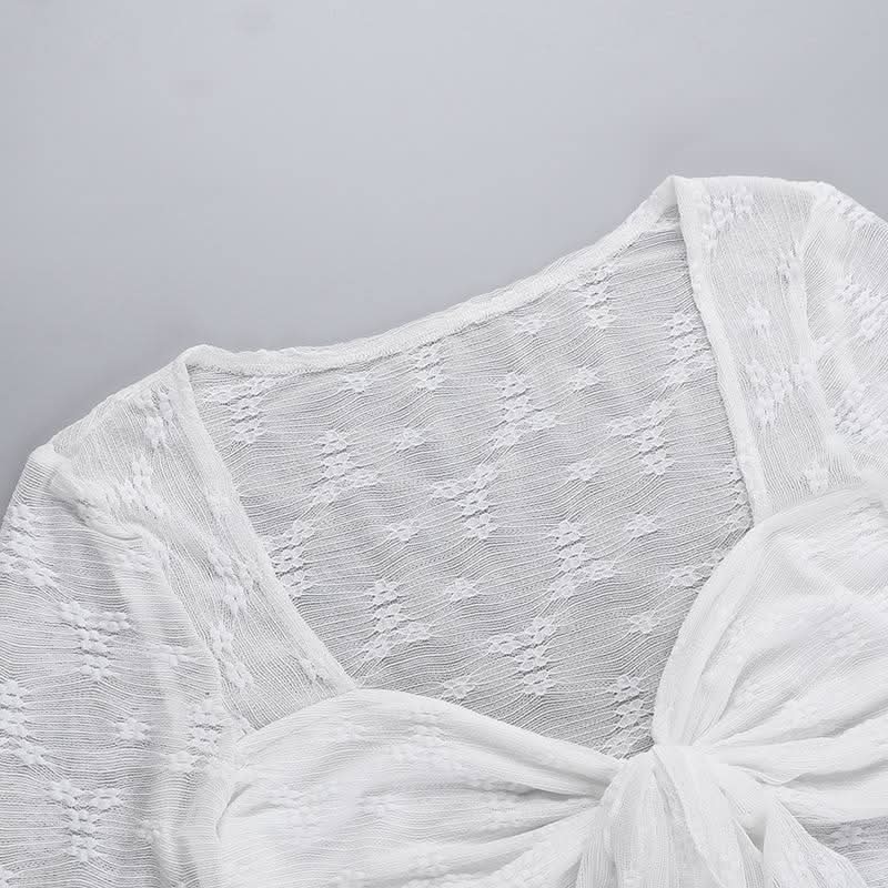 Long sleeve knotted flower pattern top