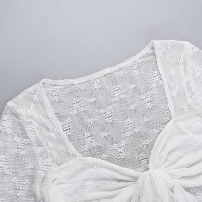 Long sleeve knotted flower pattern top