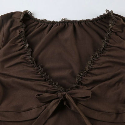 V neck long sleeve lace hem ruched bowknot top