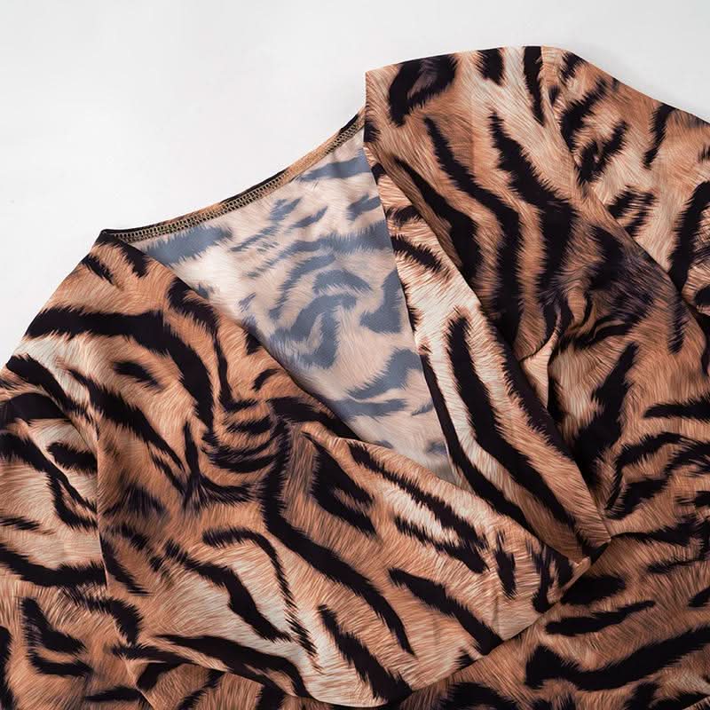 Slit long flared sleeve self tie tiger print cowl neck top