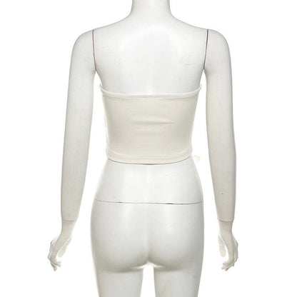 Flower applique backless solid tube top