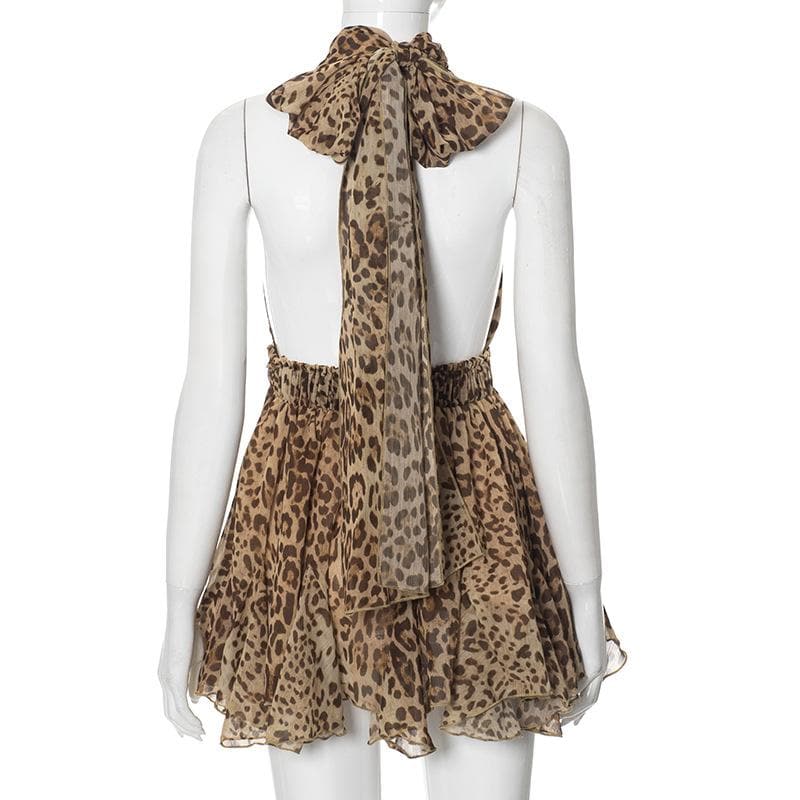 Halter cross front leopard print ruffle mini dress