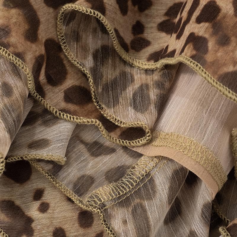 Halter cross front leopard print ruffle mini dress