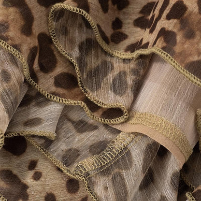 Halter cross front leopard print ruffle mini dress