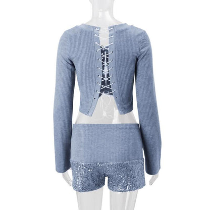 Long sleeve hollow out lace up textured round neck cut out top