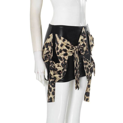 Leopard print bowknot PU leather contrast mini skirt