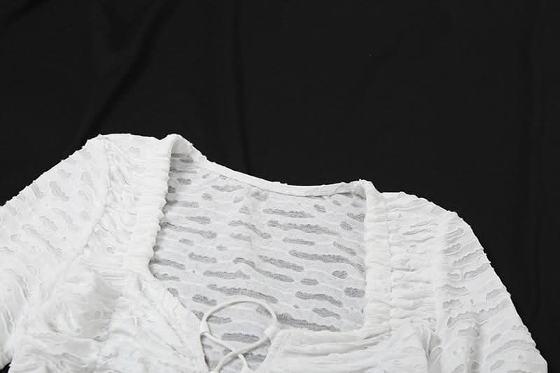 Long sleeve cross front textured top