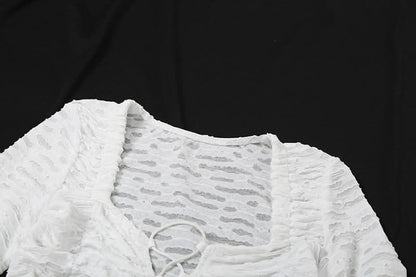 Long sleeve cross front textured top