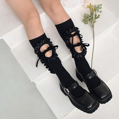 Hollow out bowknot ruffle irregular knee high socks