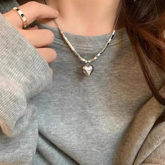 Heart pendant beaded metal chain necklace