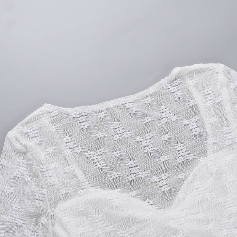 Long sleeve knotted flower pattern top