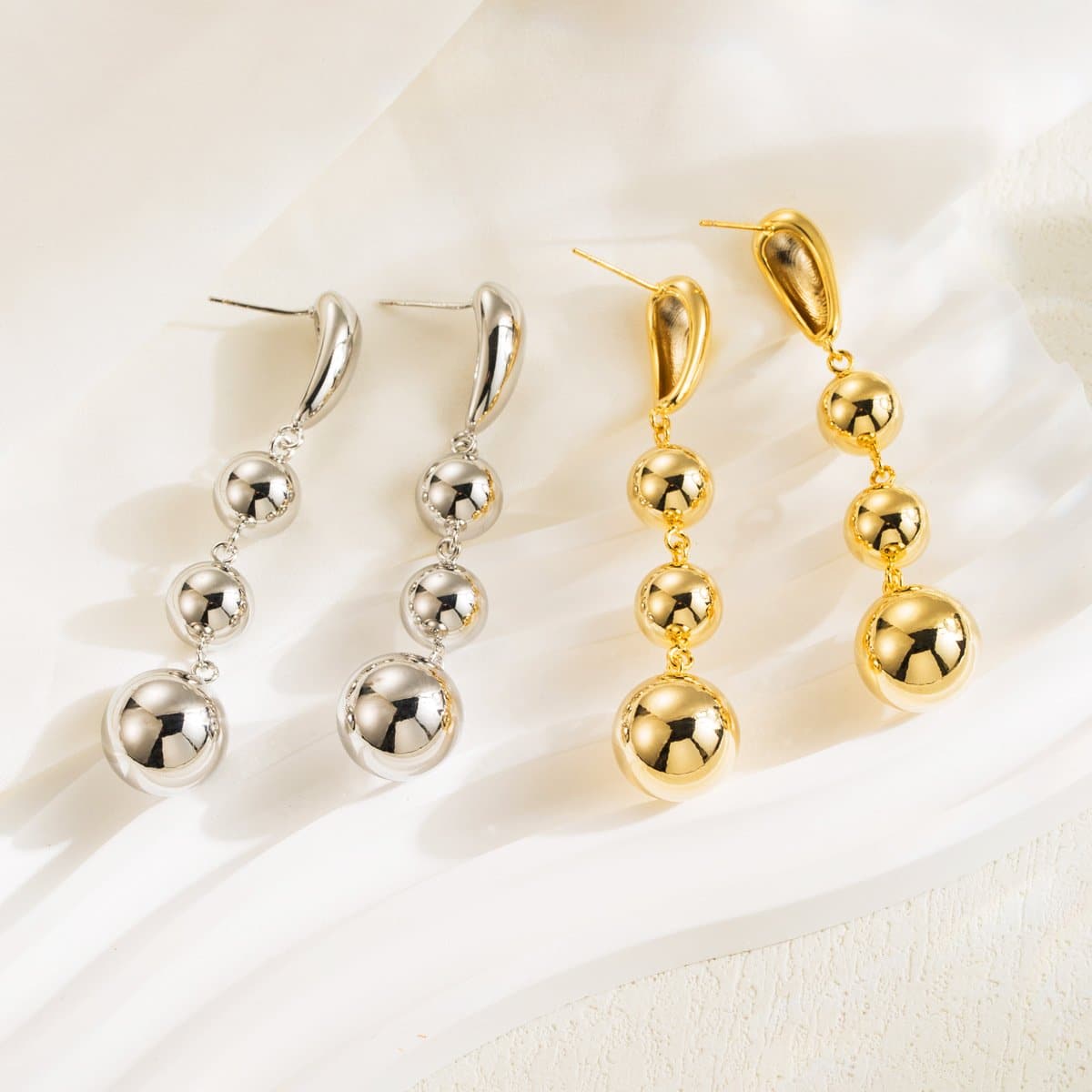Faux pearl pendant stud earrings