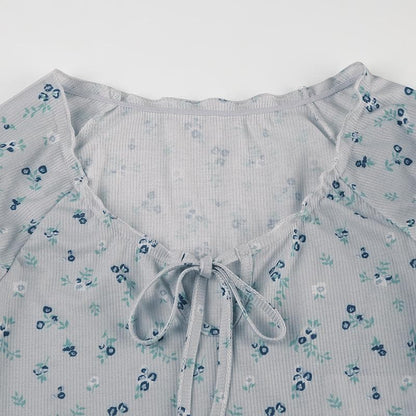 Short sleeve knotted ruffle ribbed print top