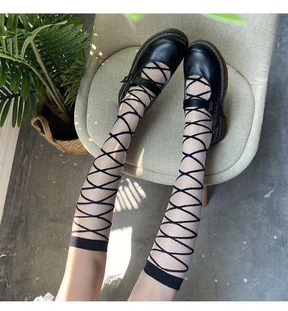 Solid cross front knee high socks