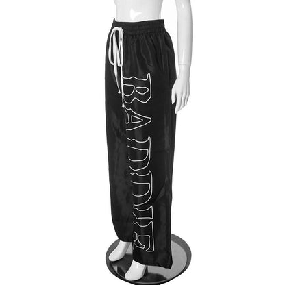 Drawstring self tie letter print medium rise pocket pant