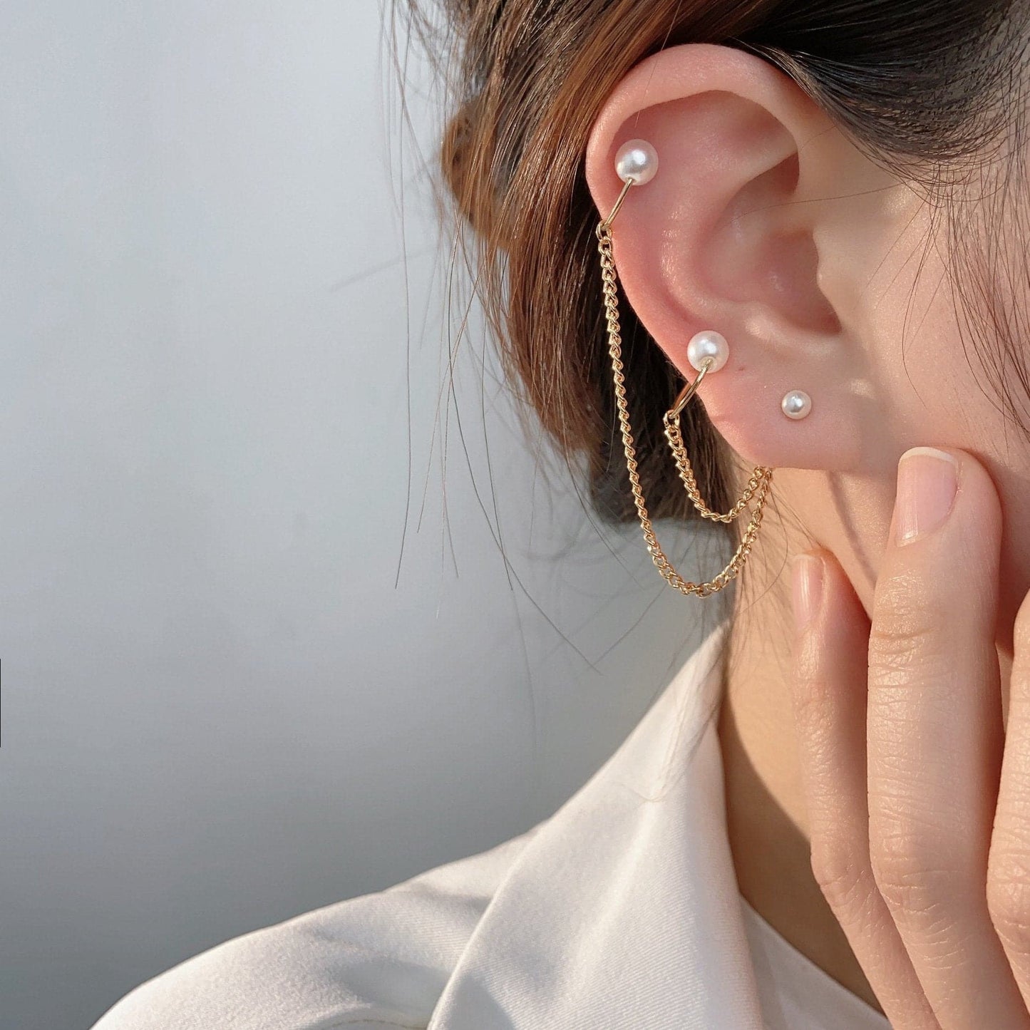 Faux pearl layered metal chain stud earrings