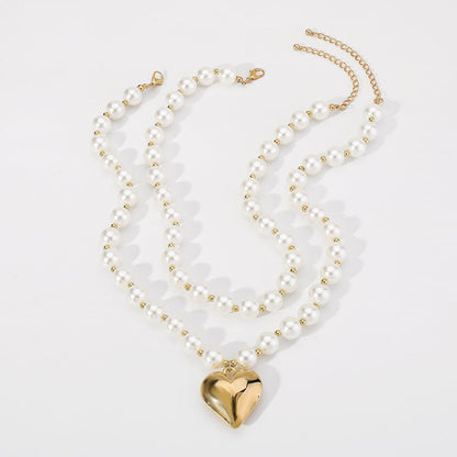 Heart pendant layered faux pearl necklace