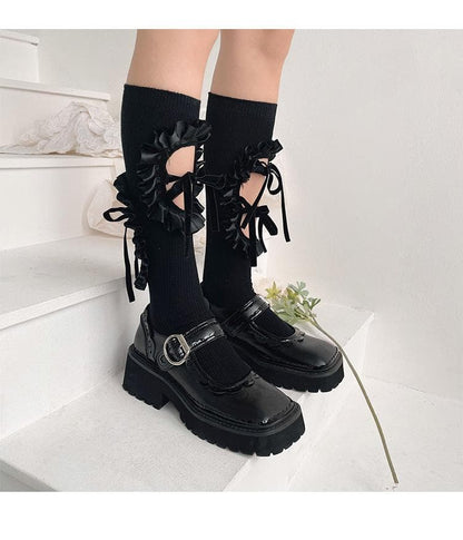 Hollow out bowknot ruffle irregular knee high socks