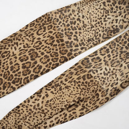 Halter cross front leopard print ruffle mini dress